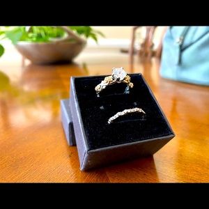 Beautiful ring with gold and silver accents with CZ stones